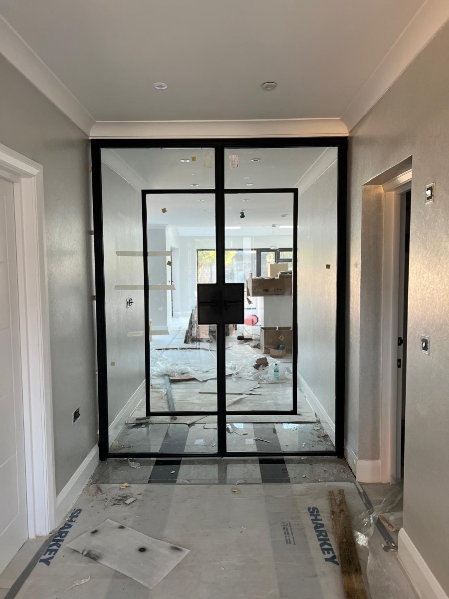 Same corridor with Crittall-style internal glass doors fitted