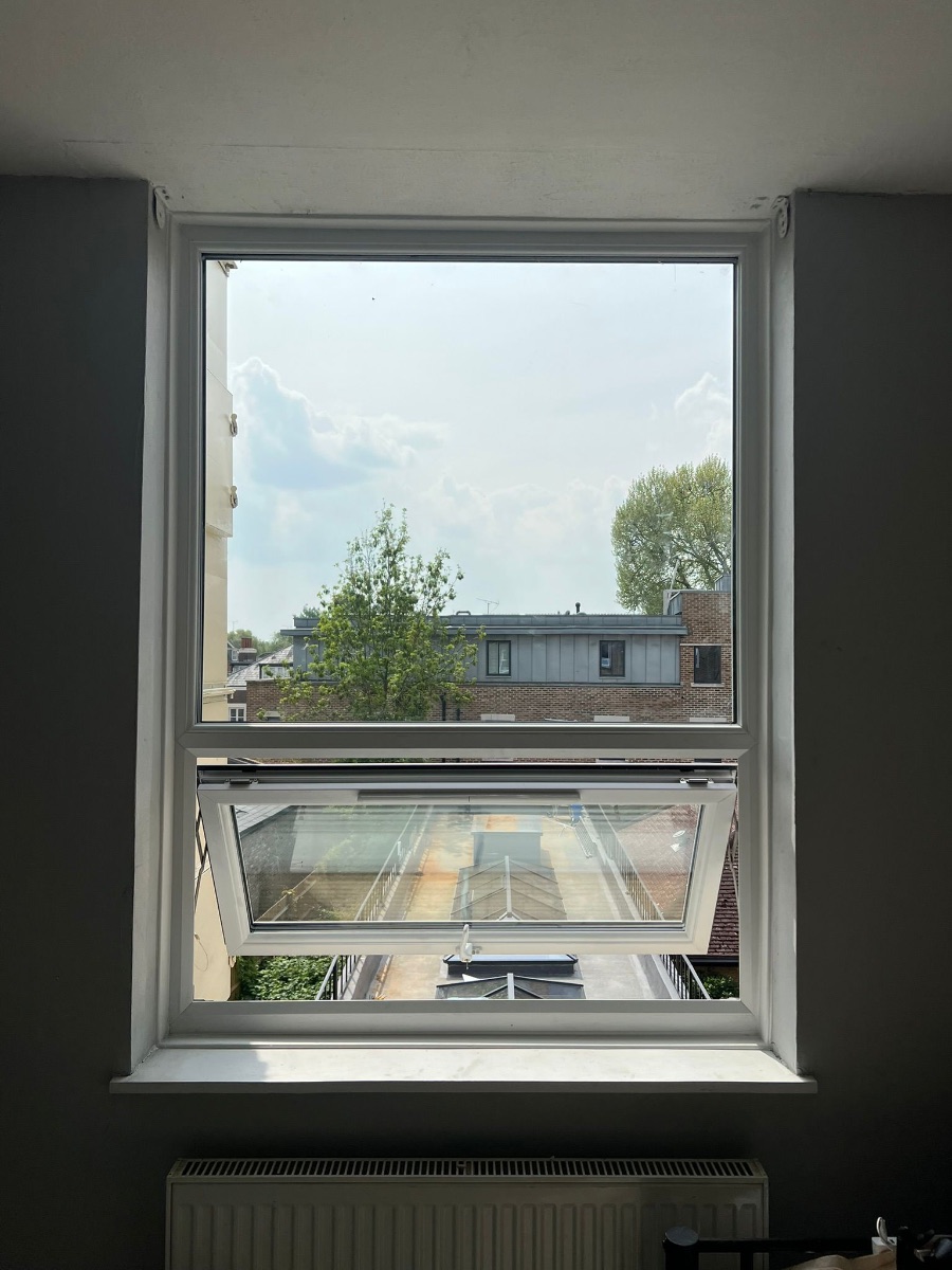 UPVC tilt-and-turn window opened inward